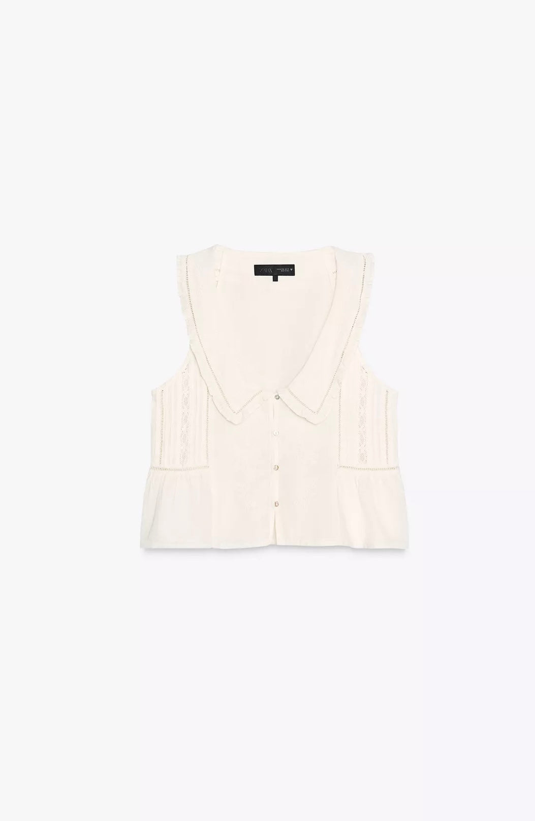 TOP BORDADOS CUELLO BOBO