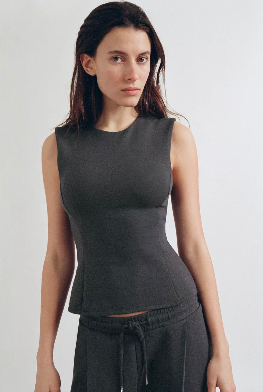 TOP PEPLUM INTERLOCK
