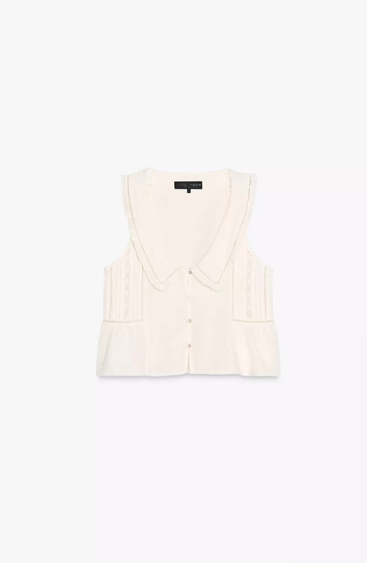TOP BORDADOS CUELLO BOBO